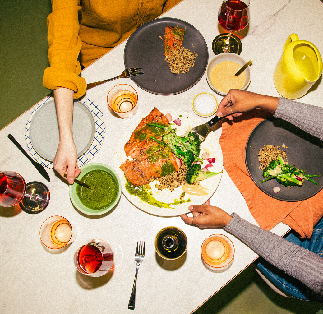 Overhead table set with salmon, broccoli and quinoa